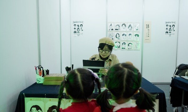 'iM패밀리데이' 행사장에서 아이들이 캐리커처 부스를 체험하는 모습. [사진=iM금융그룹]